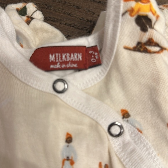 Milkbarn Cream Romper with Ski Print - Picture 2 of 3